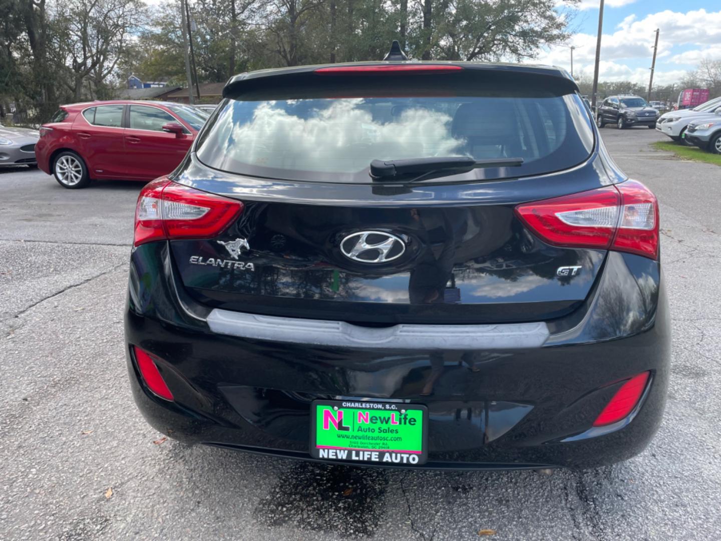 2014 BLACK HYUNDAI ELANTRA GT BASE (KMHD35LH8EU) with an 2.0L engine, Automatic transmission, located at 5103 Dorchester Rd., Charleston, SC, 29418-5607, (843) 767-1122, 36.245171, -115.228050 - Photo#5